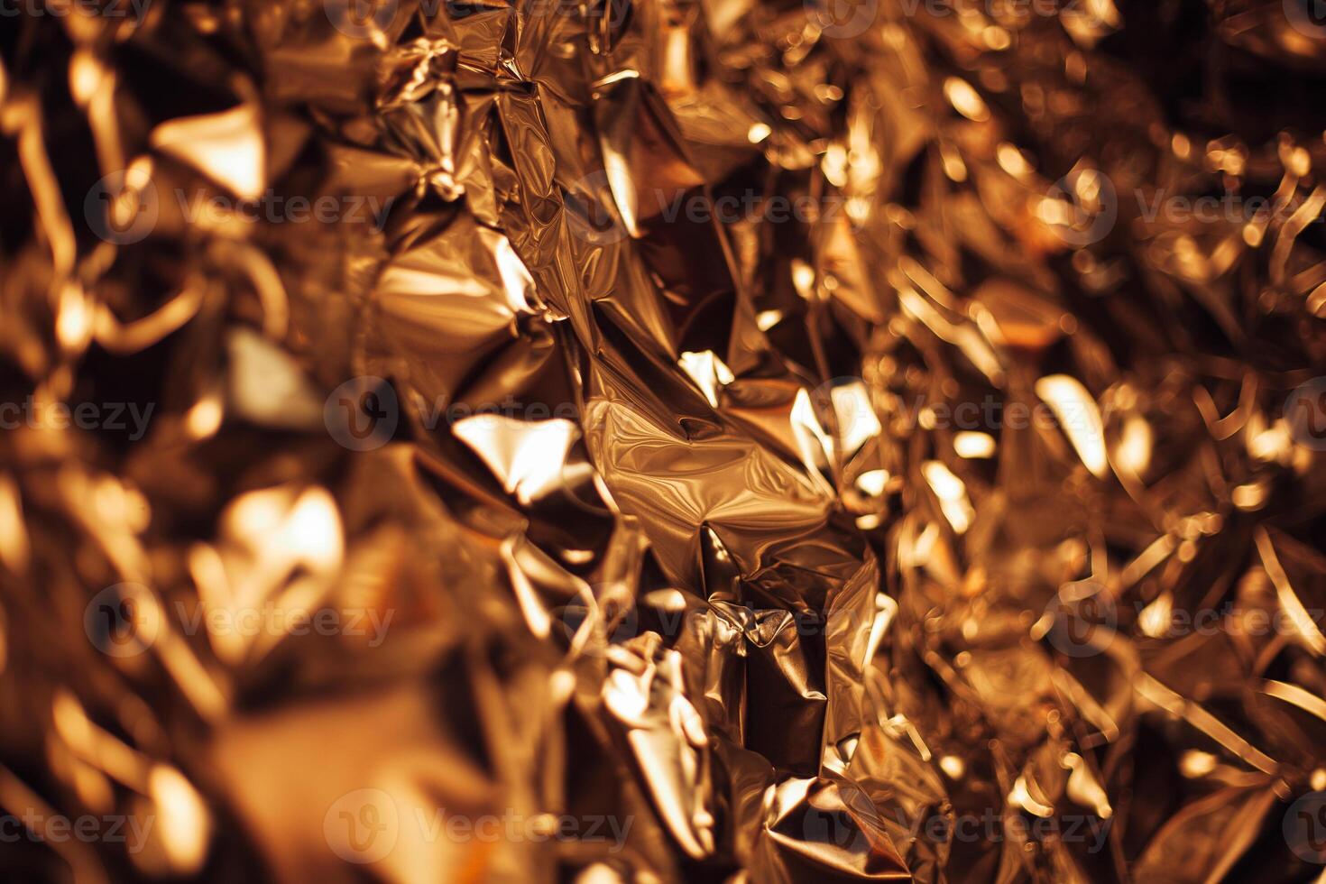 Full frame take of a sheeT of crumpled gold aluminum foil photo