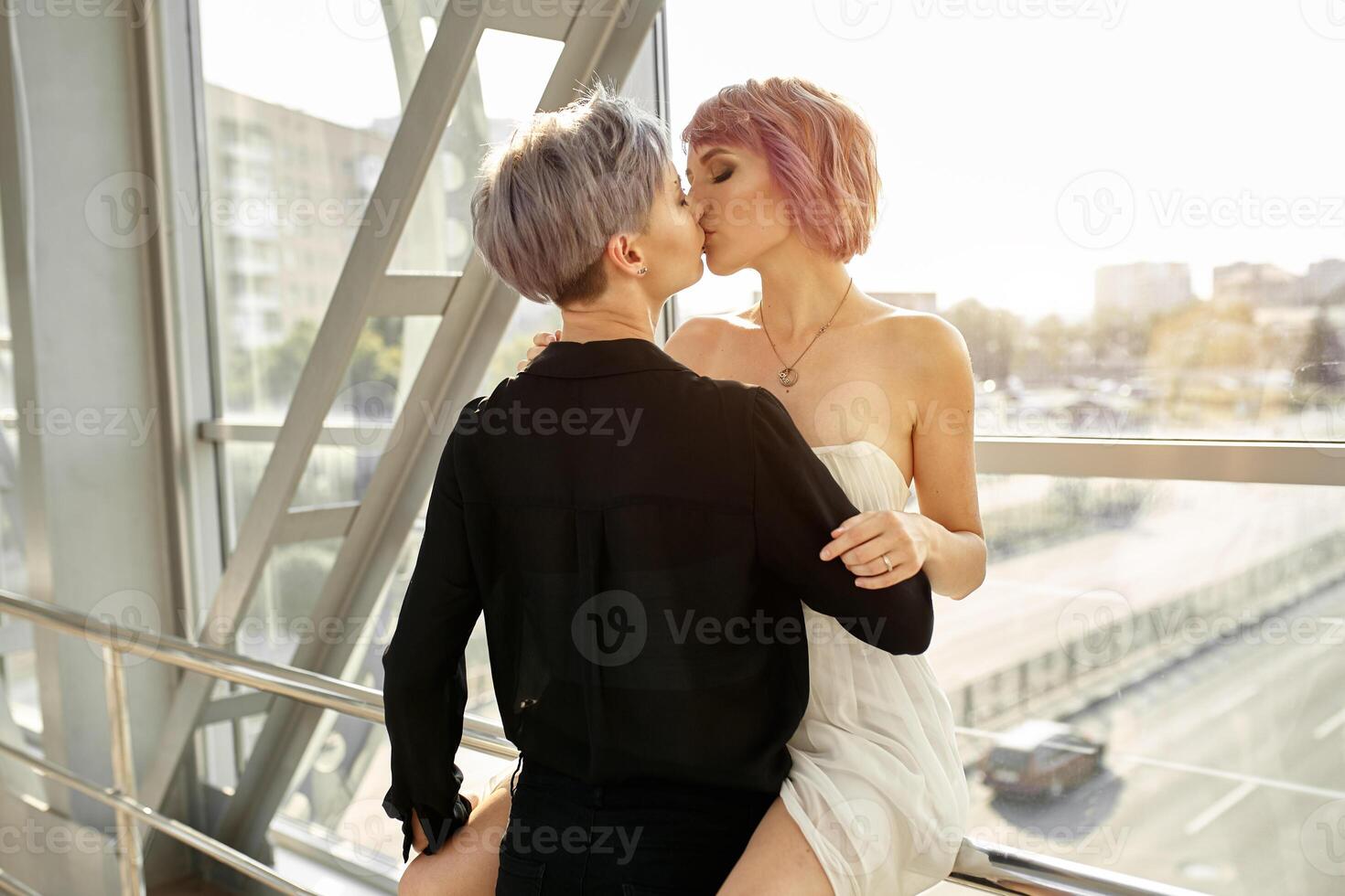 Beautiful lesbian couple hugging. Love and passion between the two girls. photo