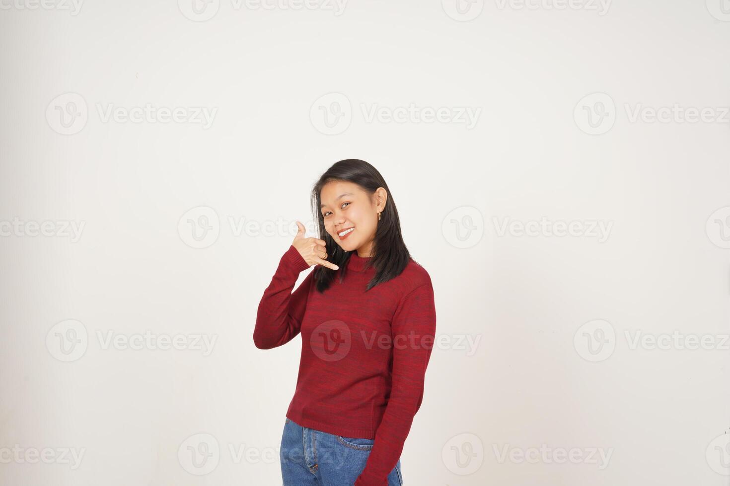 Young Asian woman in Red t-shirt Call me back gesture isolated on white background photo