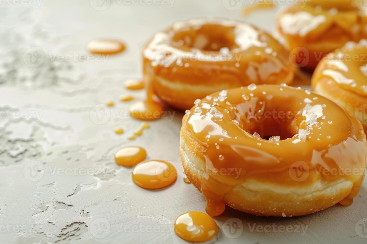 AI generated Donuts in salted caramel glaze on a light background with copy space photo
