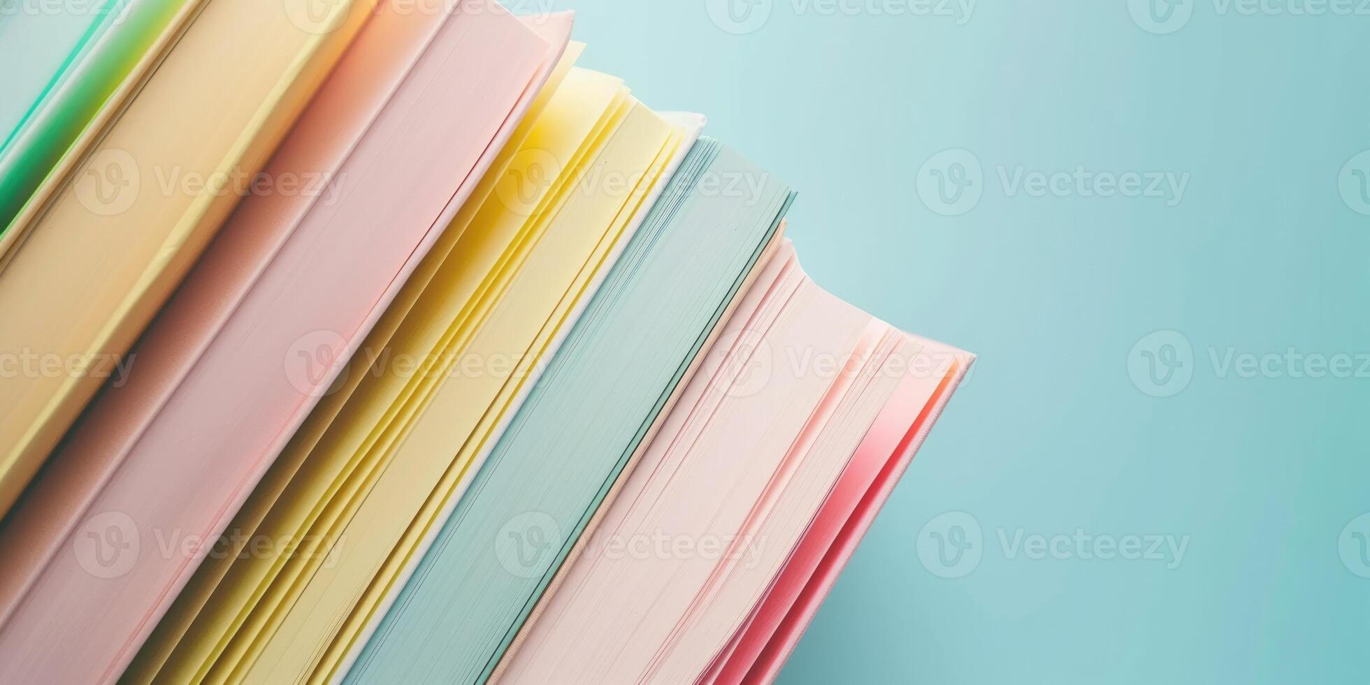 AI generated Close-up of a stack of books on a pastel blue background with copy space photo