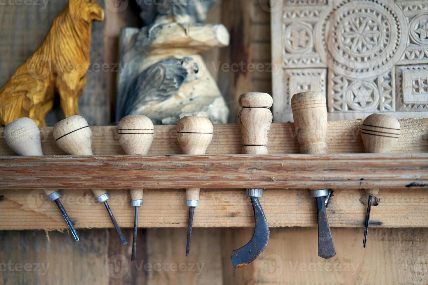 Wood carving tool Carpenter tools in stand at workplace photo