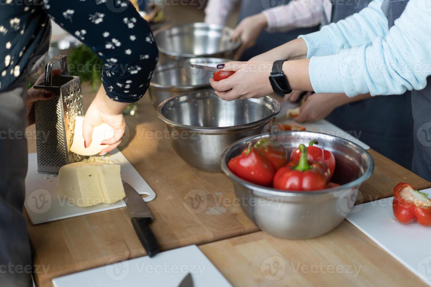 Unrecognizable large family preparing dinner for the holiday. photo