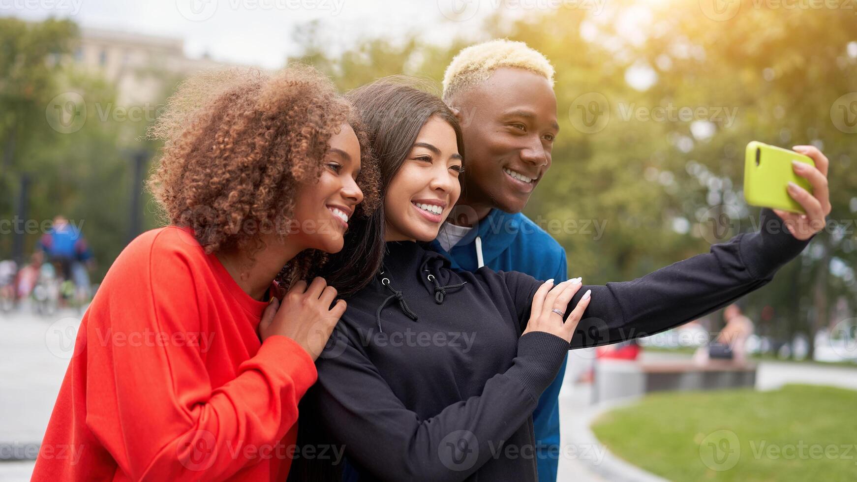 Multi ethnic friends outdoor. Diverse group people Afro american asian spending time together photo
