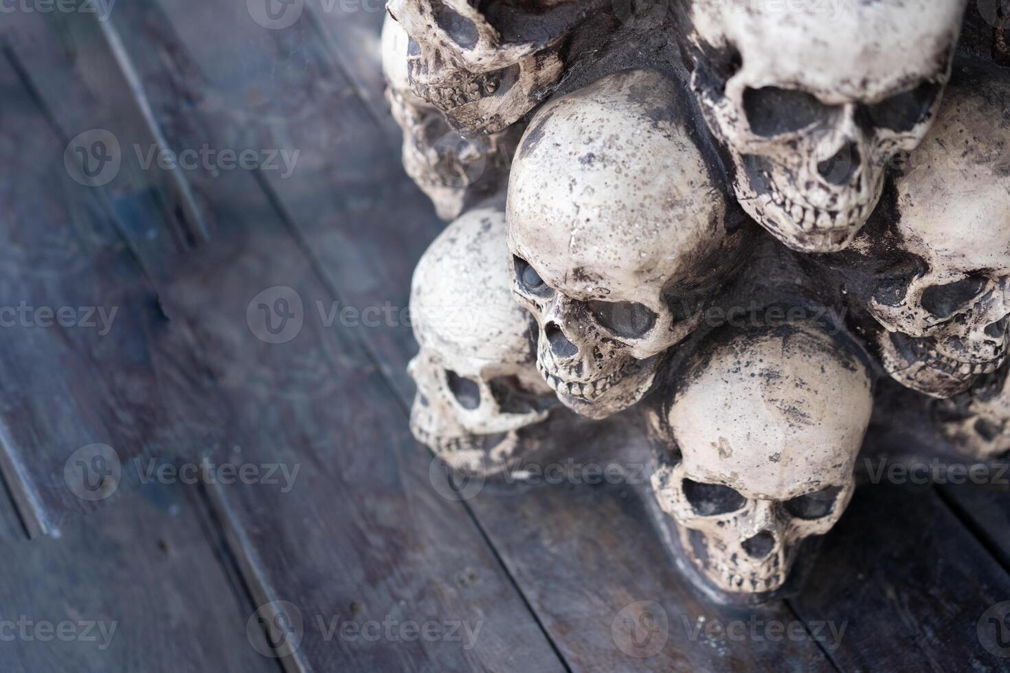Skull Halloween Background Many People Skulls Stand on top of each other. Mystic creepy concept. Abstract nightmare occult memorial photo