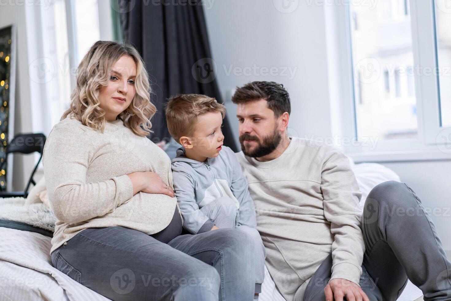 Happy family concept Mother father and son have fun at home photo