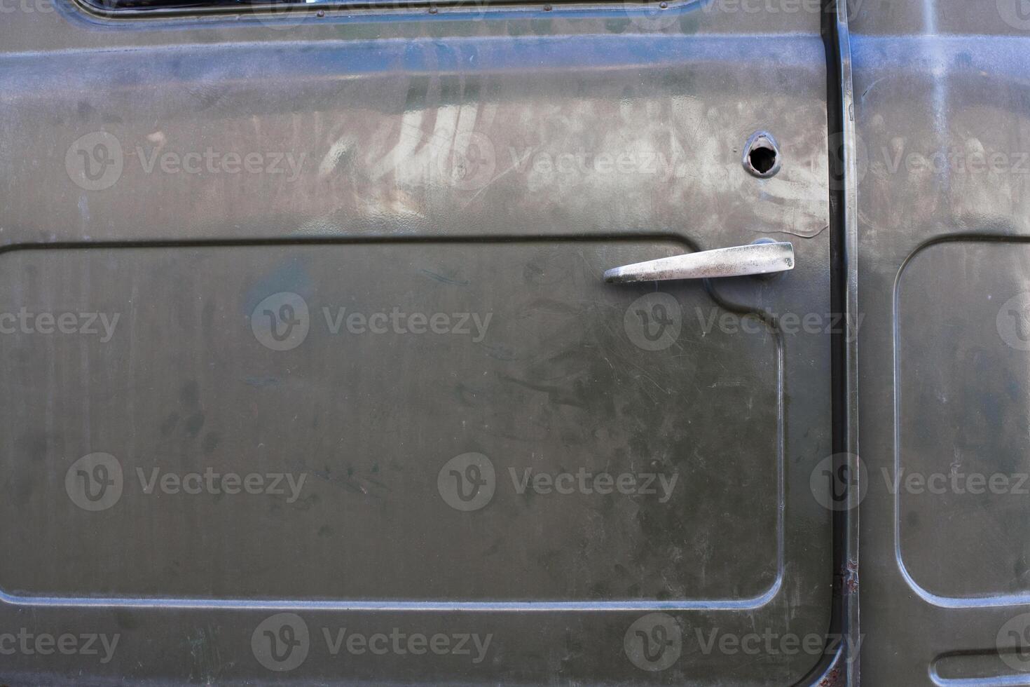 oxidado resistido sucio retro coche puerta con muchos rasguño antecedentes textura de cerca foto