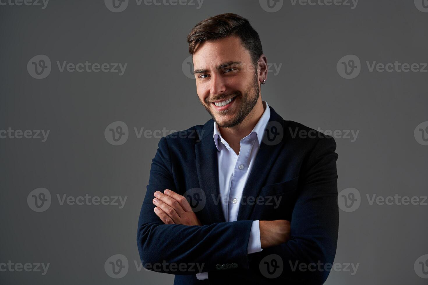 Close up portrait young man businessman. Caucasian guy business suit studio gray background. photo