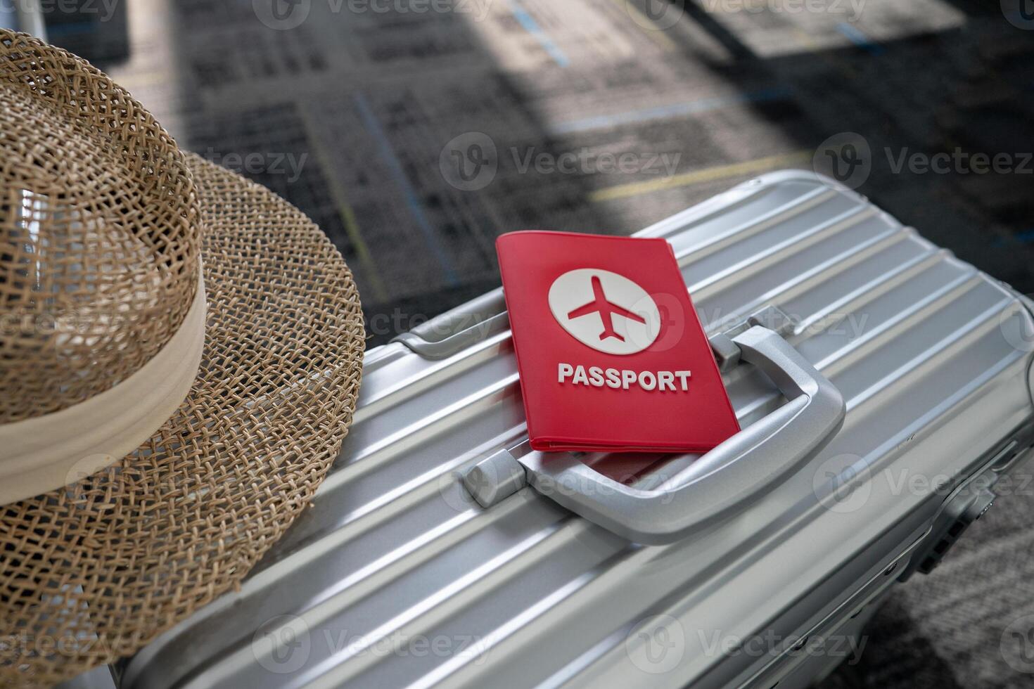 Hand holding passport at the airport at boarding gate. photo