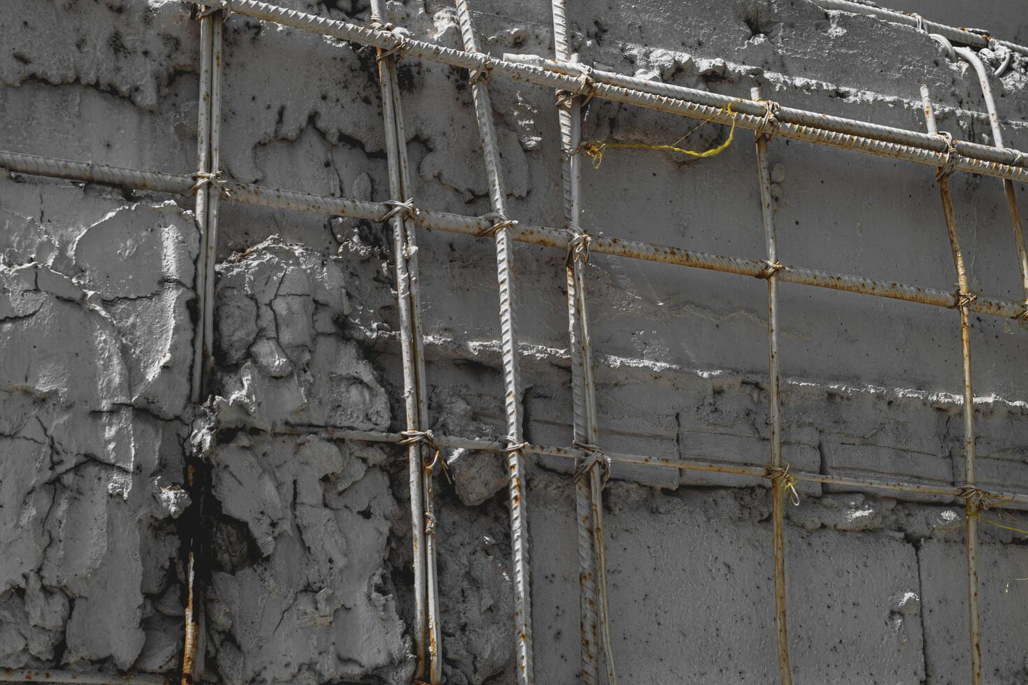 Crack of wall construction with steel bar. photo