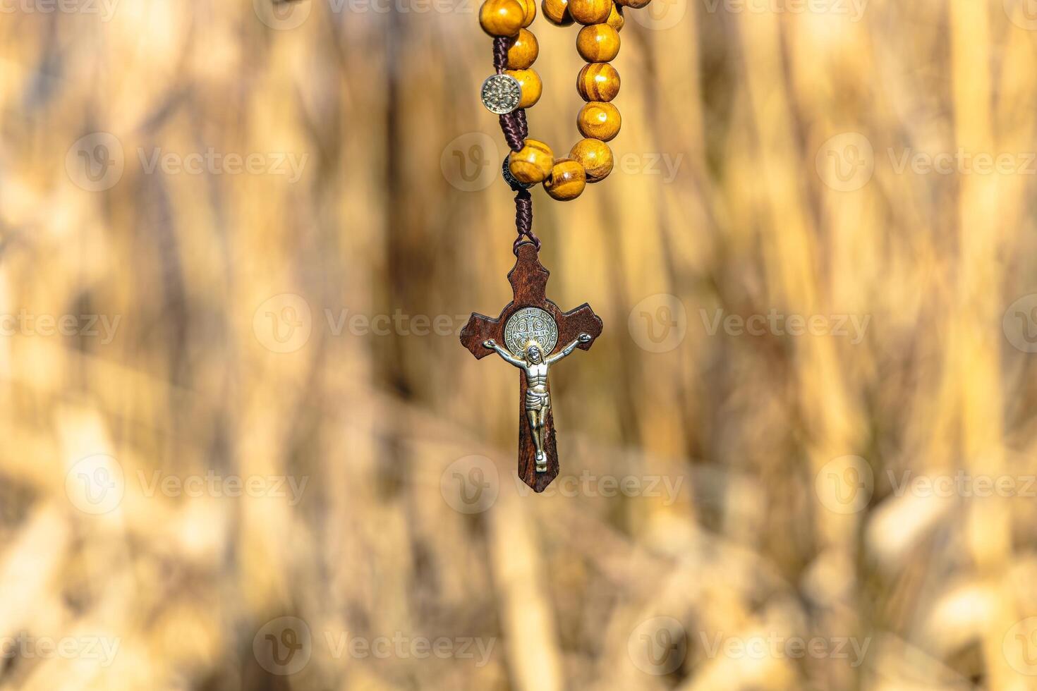 Religious Christian theme with Biblical concept of Jesus Christ crucified on the cross for the holiday of Palm Sunday or Christmas photo