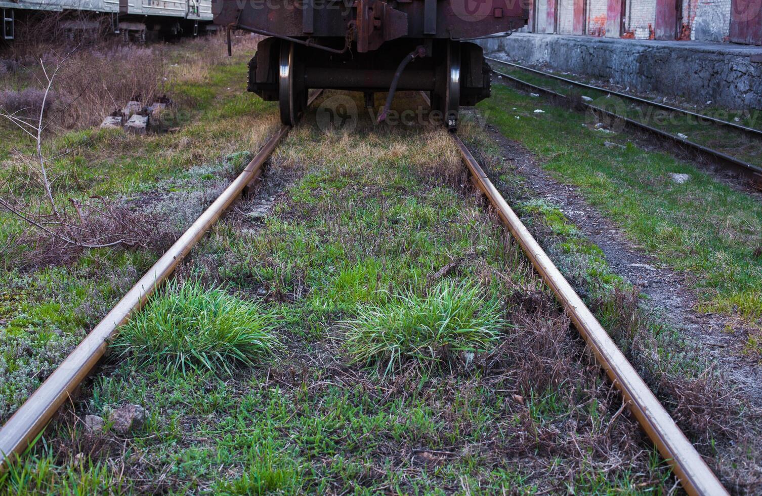 Railway tracks up-close on a sunny day. photo