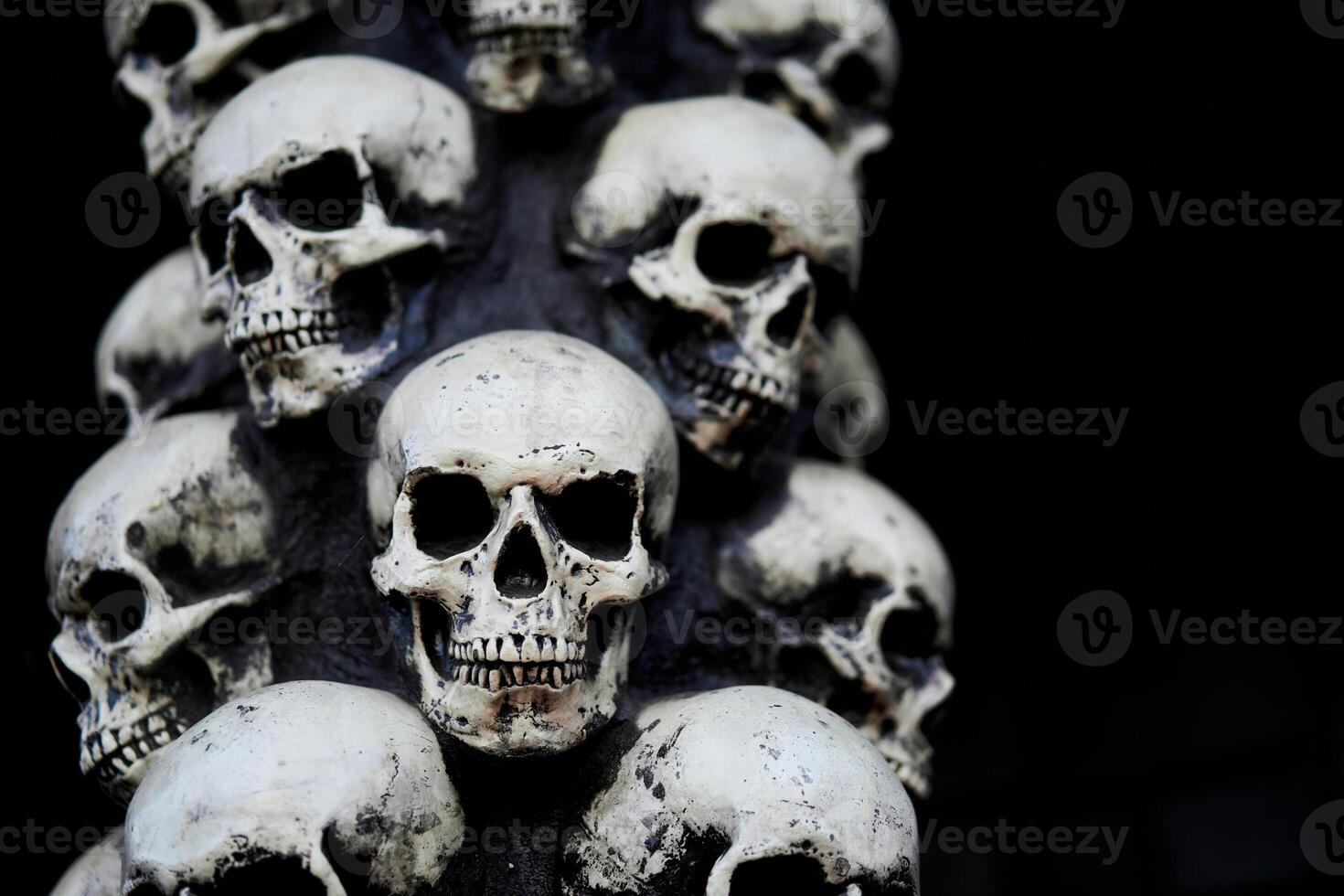 Skull Halloween background Many people skulls stand on top of each other. photo