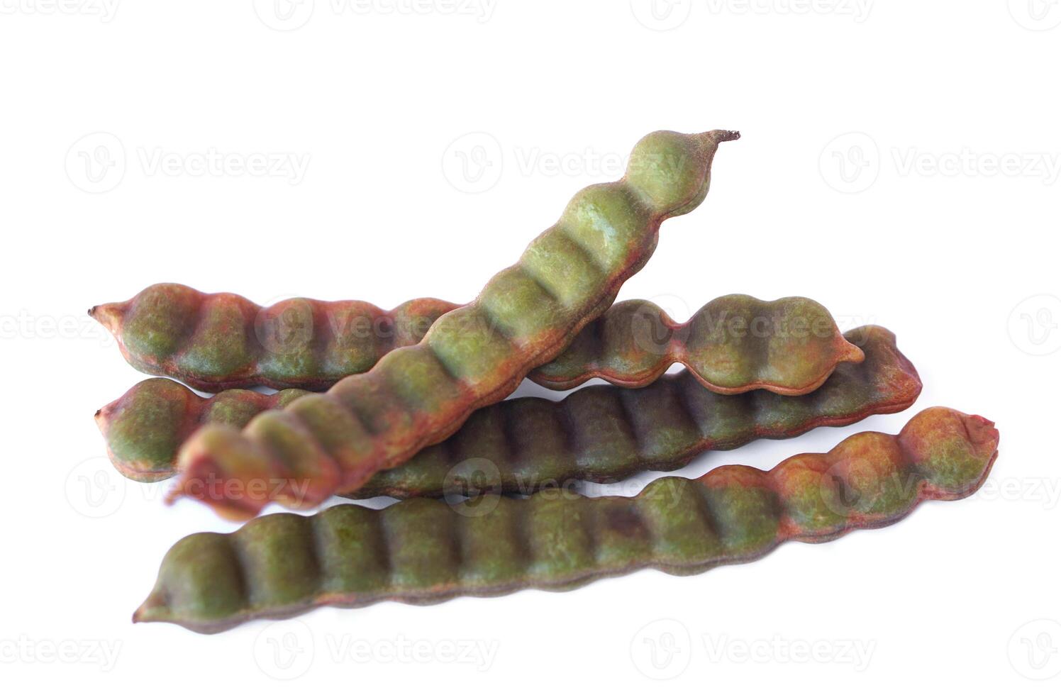 Acacia concinna pods or Soap Bobs fruits on white background. Concept, Fruit of herbal plant in Thailand, useful and benifit for health. Wild botanical plant. photo