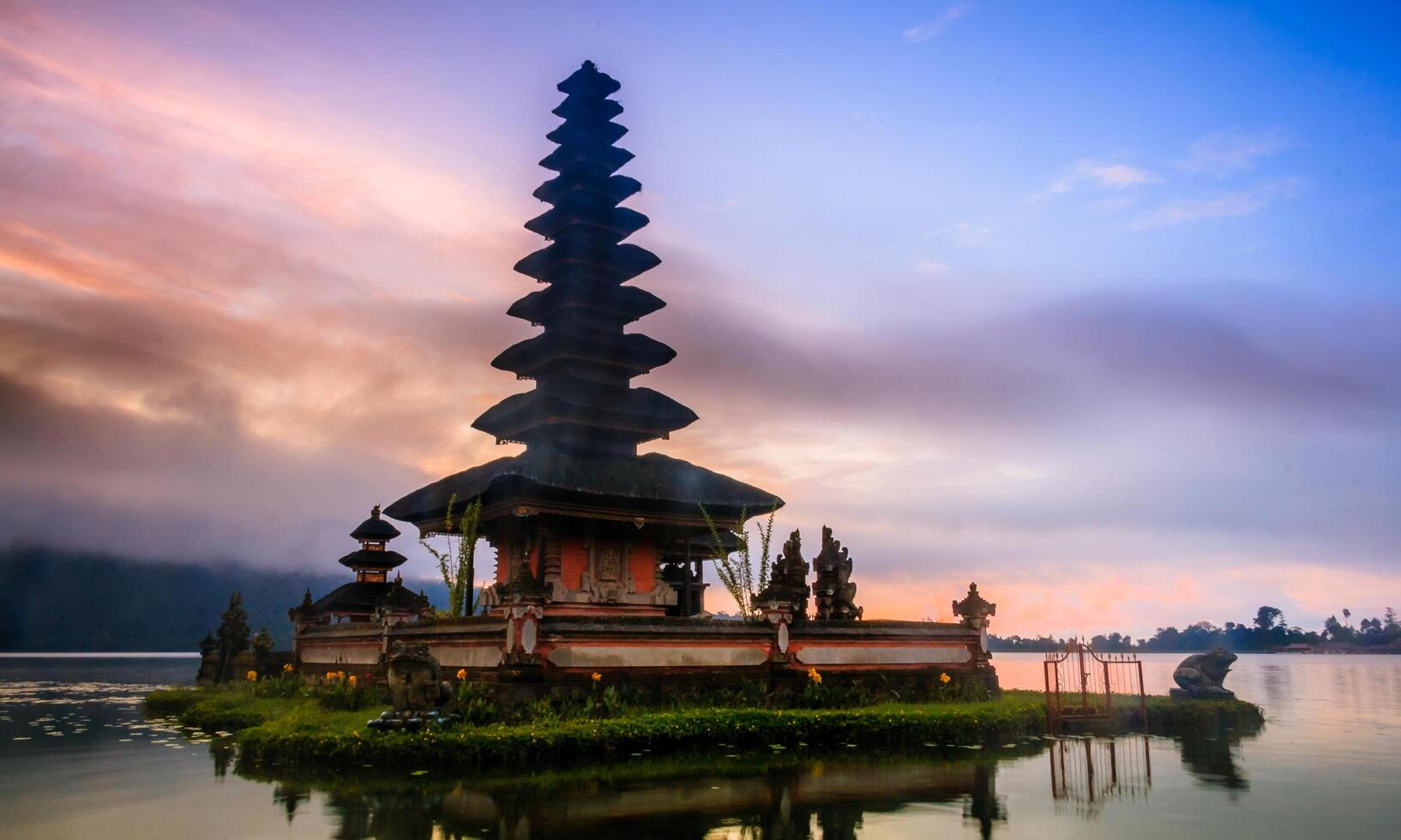 background of the silence of Nyepi day with the temple at sunset photo