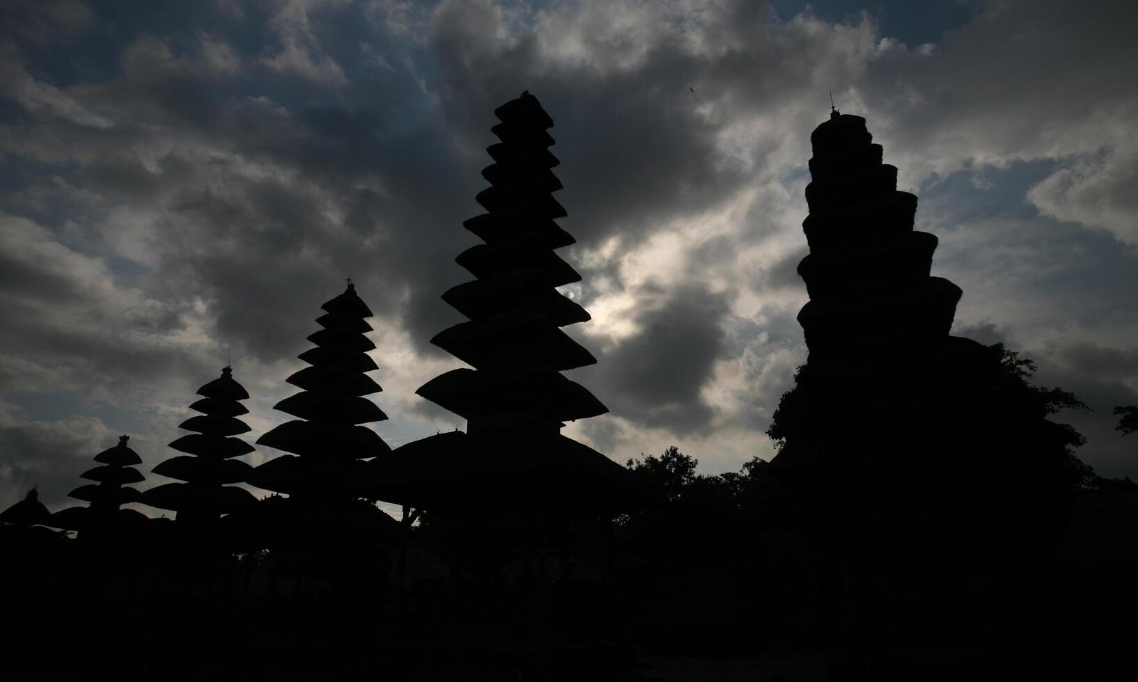 background of the silence of Nyepi day with the temple at sunset photo