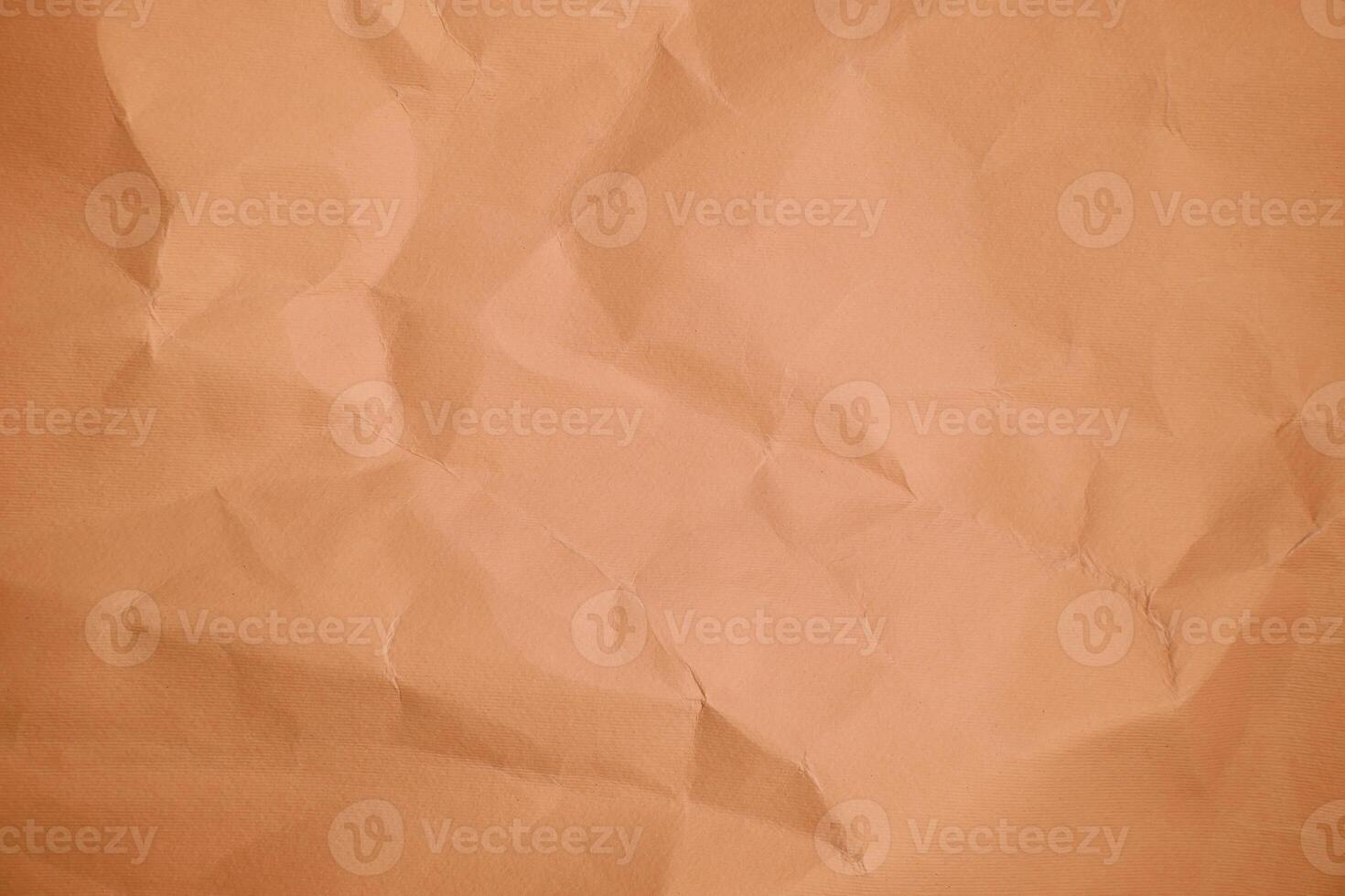 Brown Sheet crumpled paper color background  Close up Copy space photo