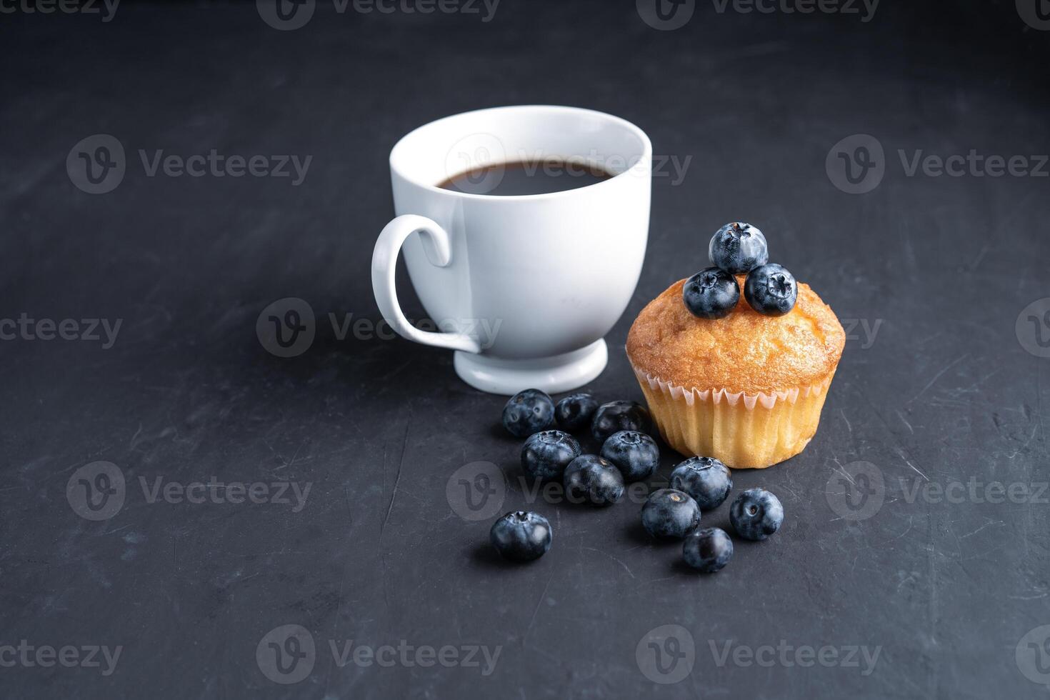 Blueberry antioxidant organic superfood and sweet muffin with cup of coffee photo