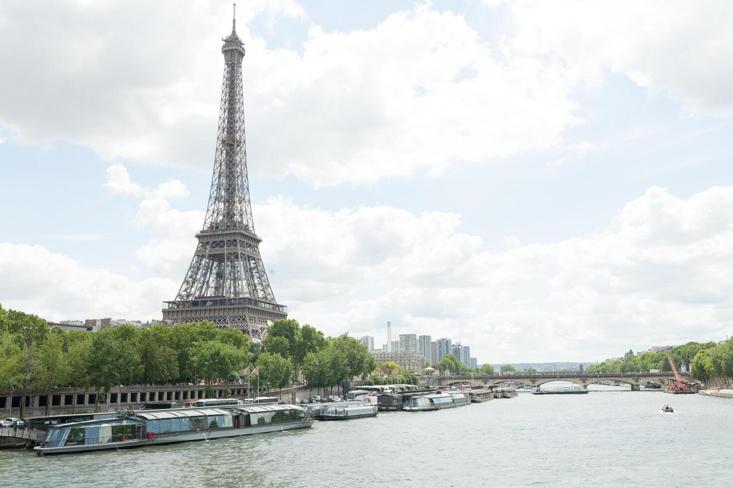 PARIS, FRANCE - 02 June 2018 View of the Eiffel Tower and Siene River in Paris, France. photo