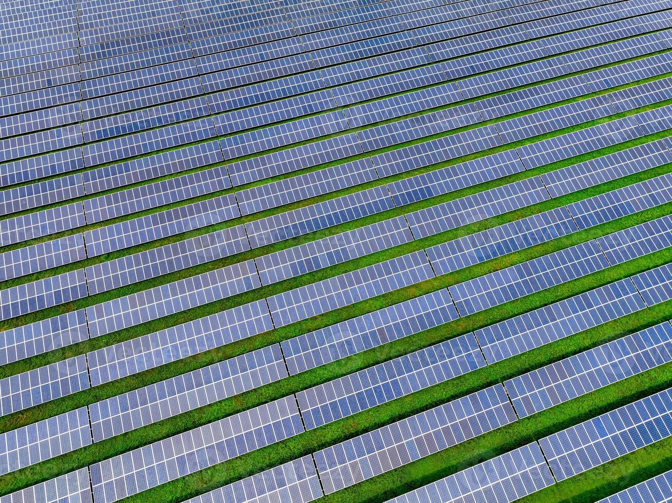 Solar farm and sun light. Solar power for green energy. Sustainable renewable energy. Photovoltaic power station or solar park. Solar panel installation and maintenance concept. Energy sustainability. photo