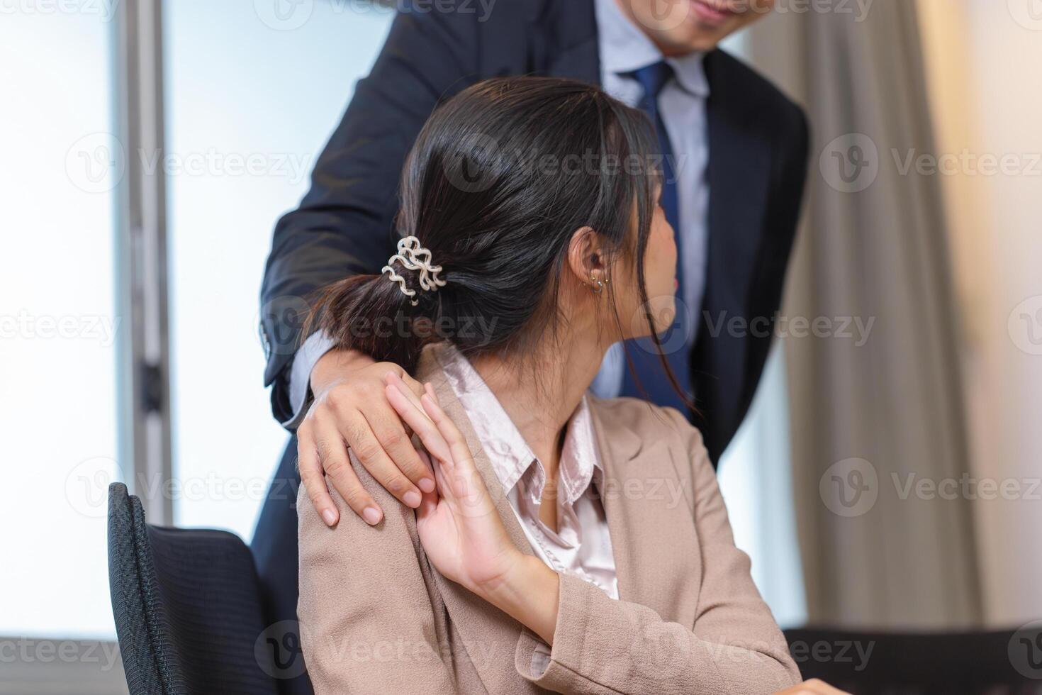 Manager and secretary working in the office photo