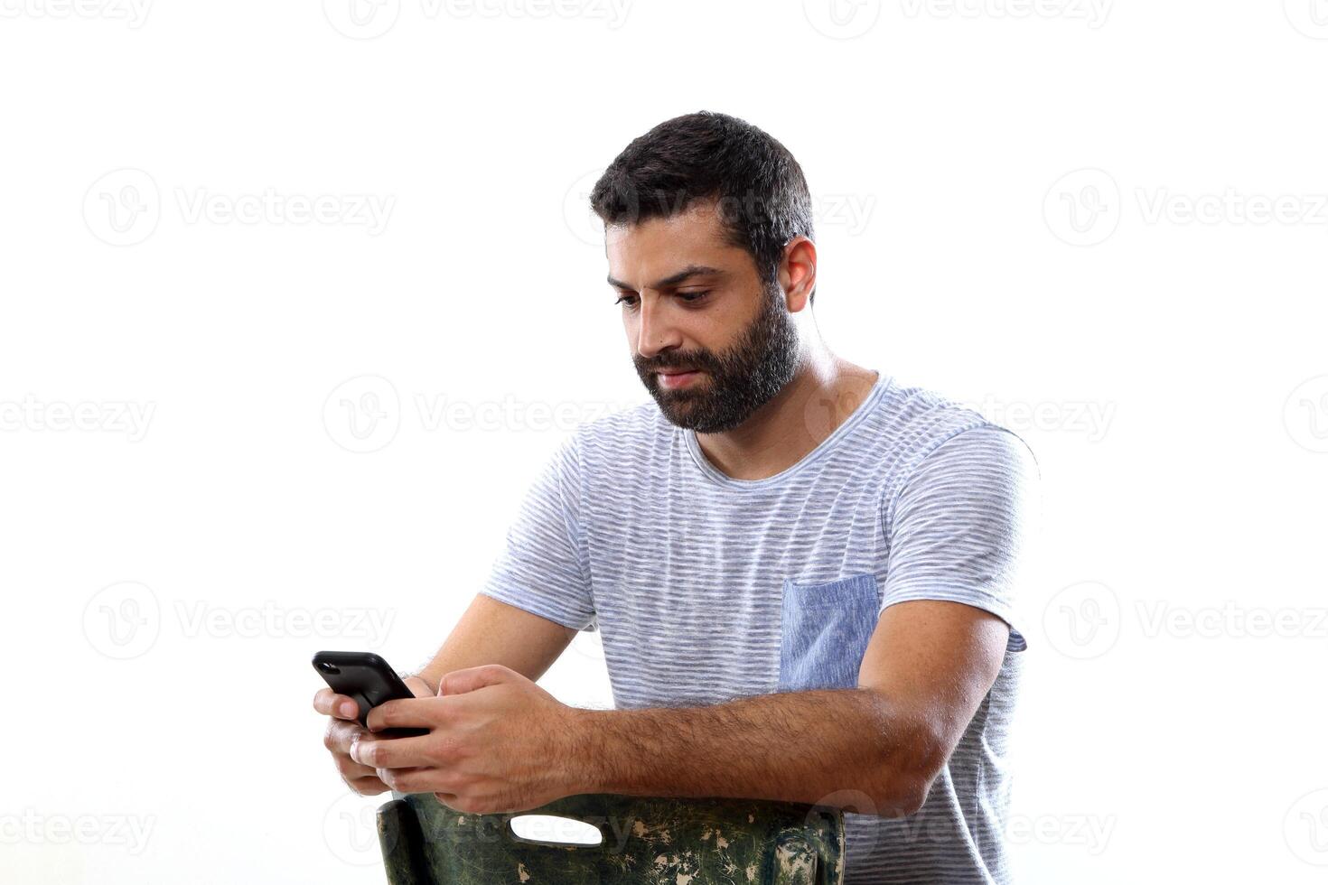 young man with a beard in several different situations photo