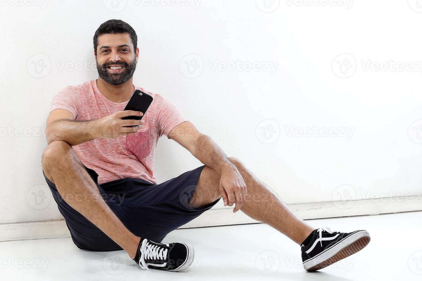 young man with a beard in several different situations photo