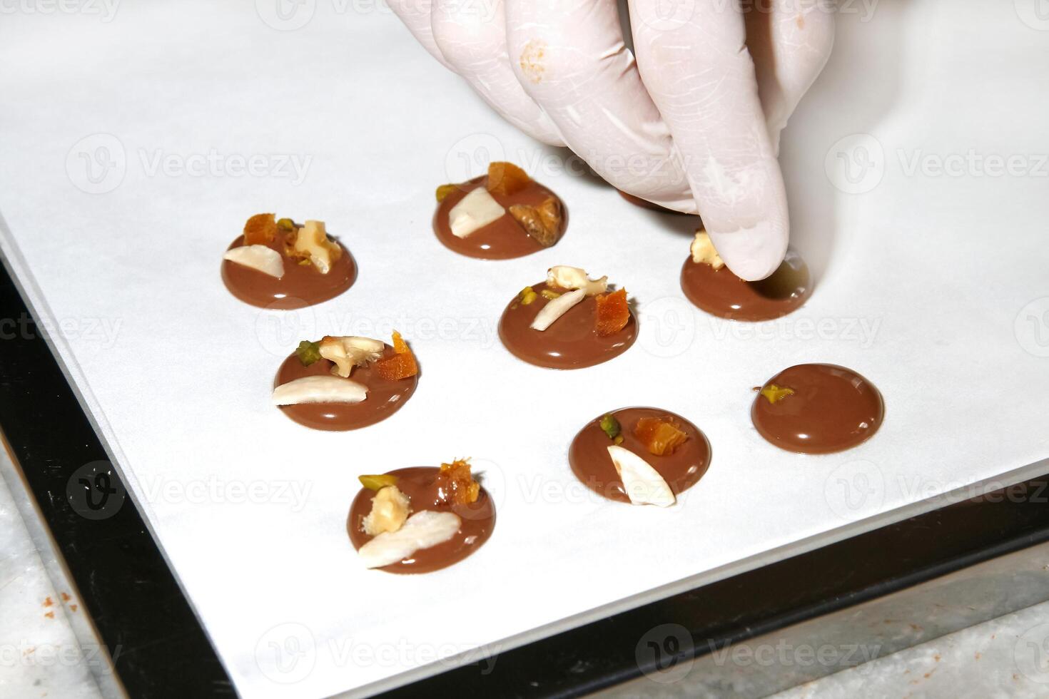 step by step production of chocolate candies photo