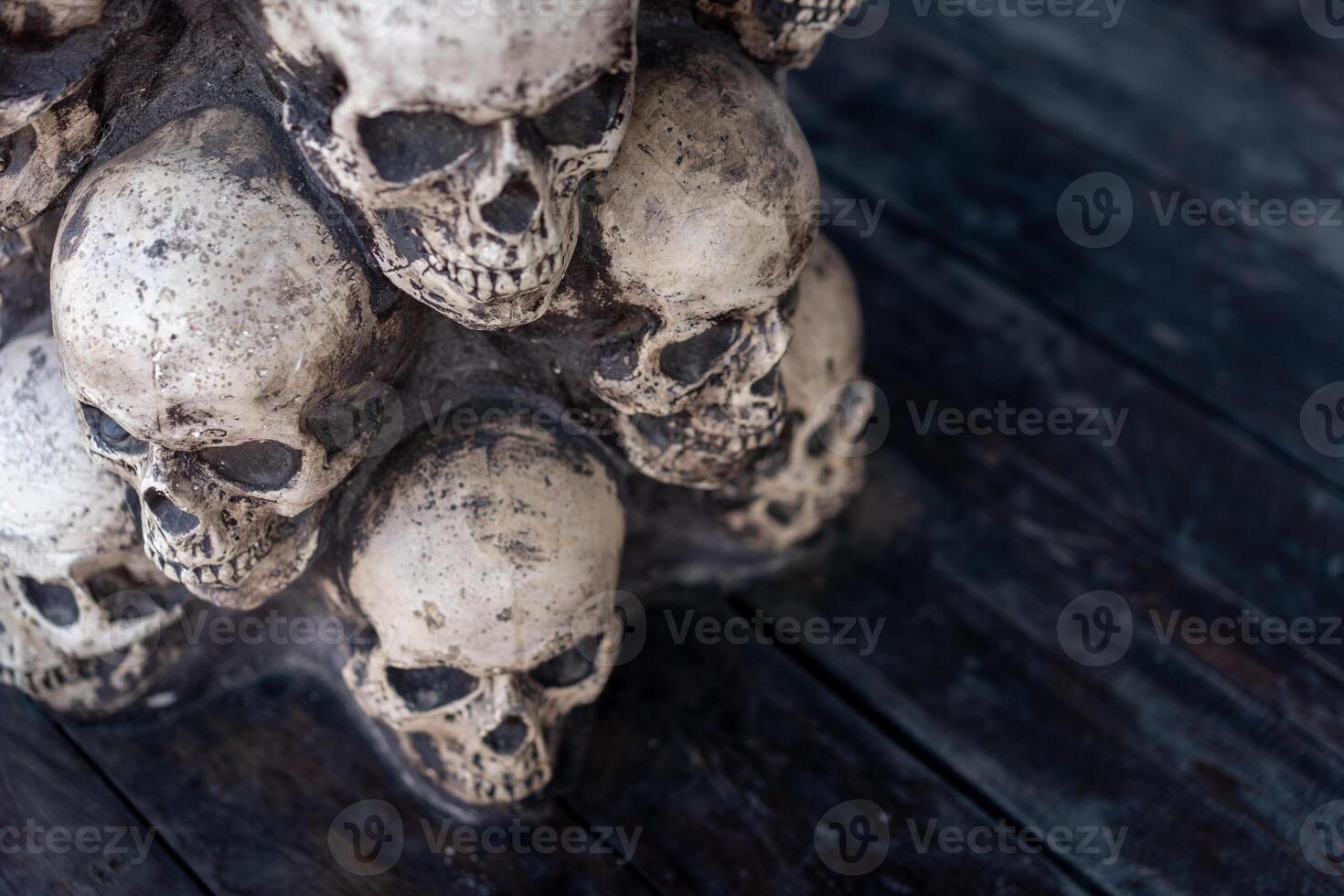 Skull Halloween Background Many People Skulls Stand on top of each other. Mystic creepy concept. Abstract nightmare occult memorial photo