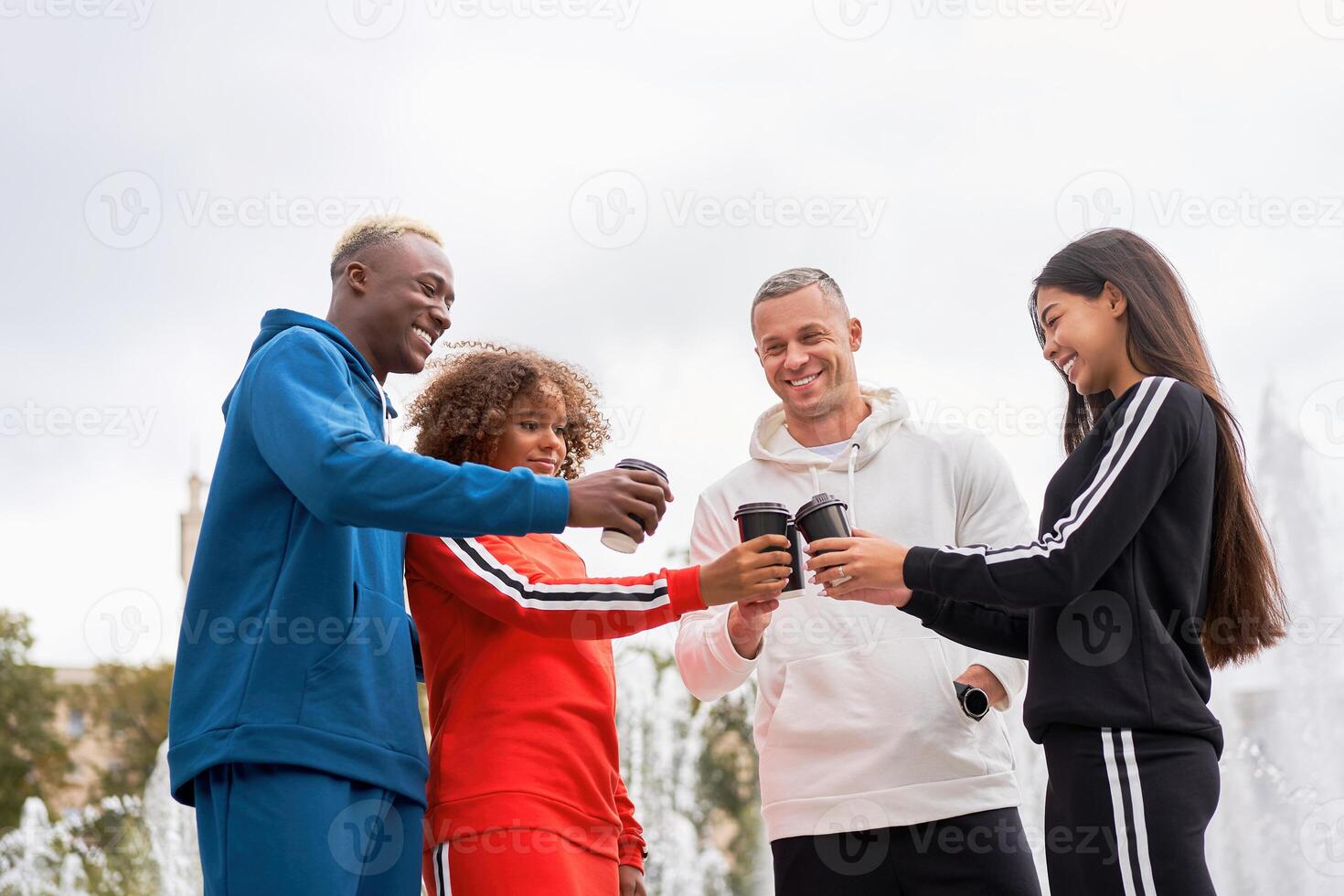 Multi-ethnic group people teenage friends. African-american, asian, caucasian student spending time together Multiracial friendship photo