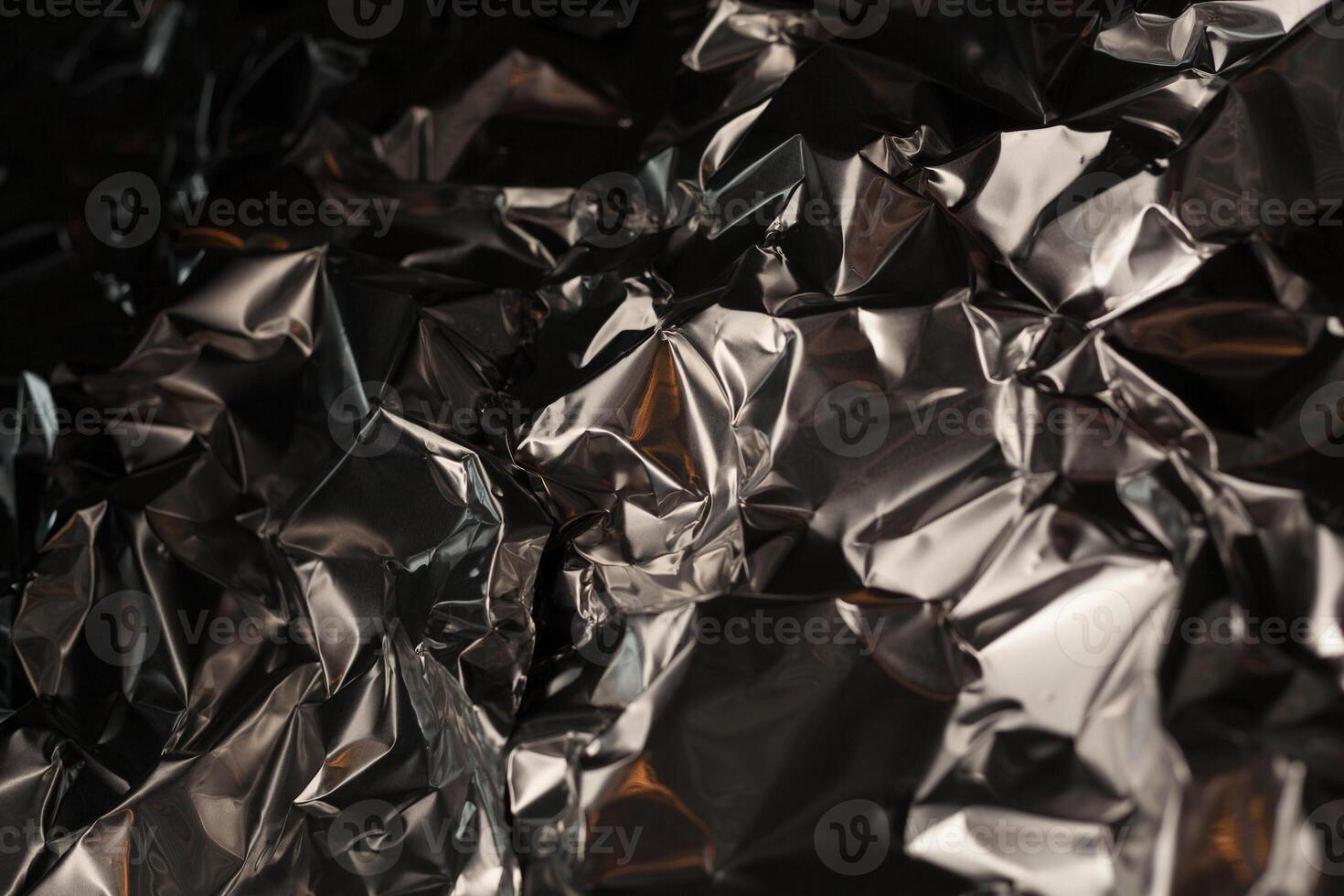 Full frame take of a sheeT of crumpled silver aluminum foil photo