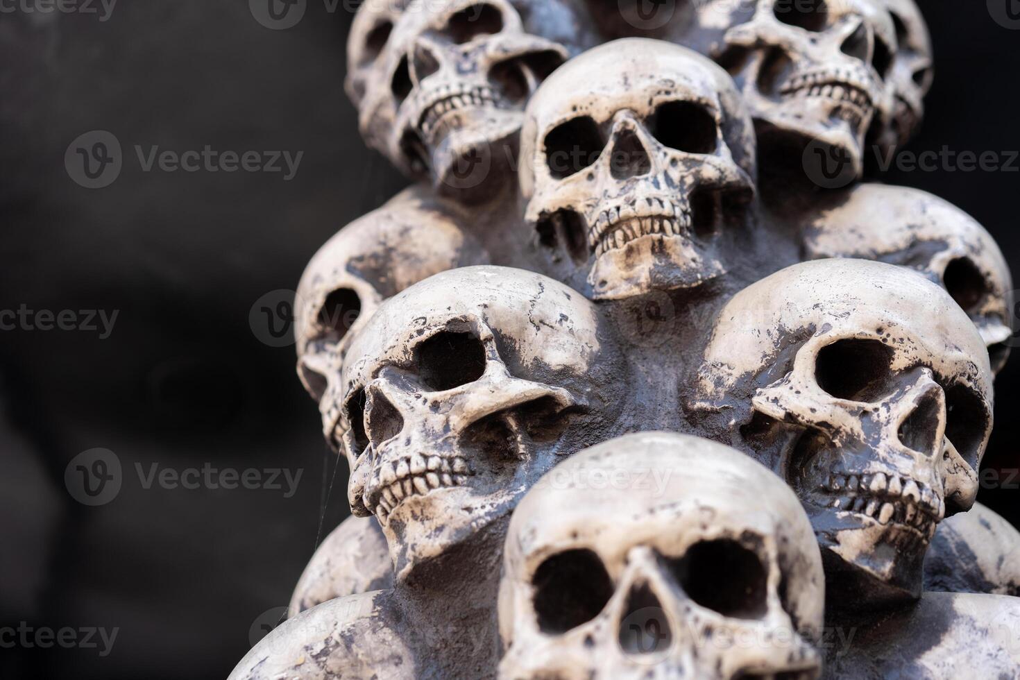 Skull Halloween Background Many People Skulls Stand on top of each other. Mystic creepy concept. Abstract nightmare occult memorial photo