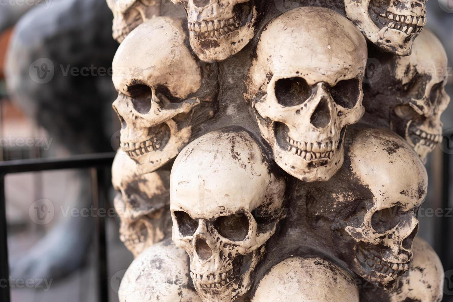 Skull Halloween Background Many People Skulls Stand on top of each other. Mystic creepy concept. Abstract nightmare occult memorial photo