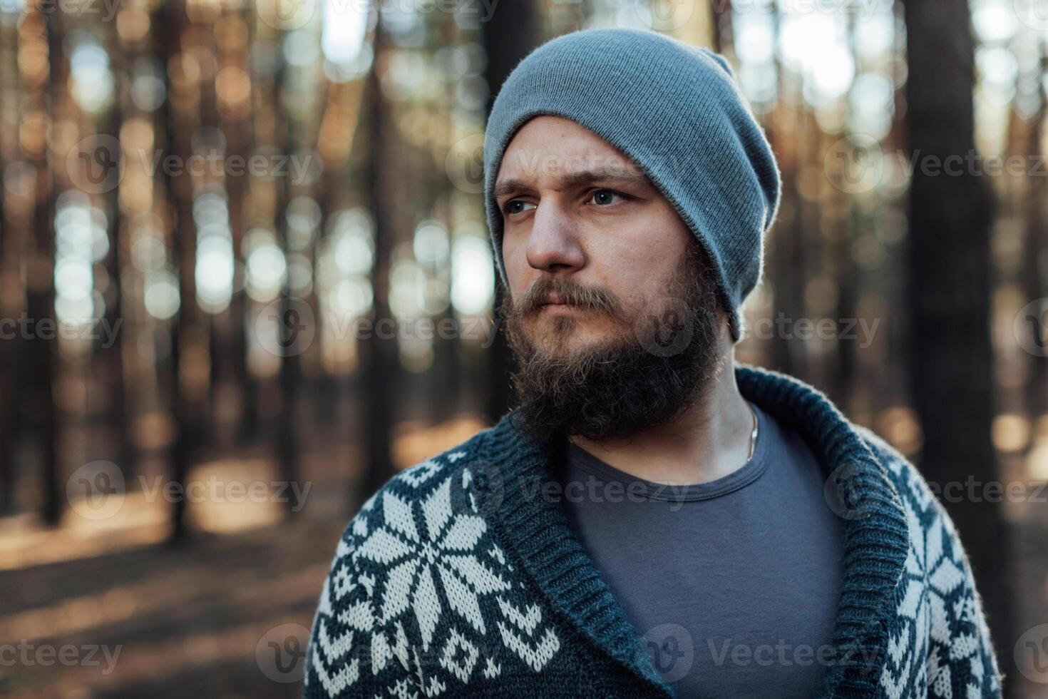 Outdoor portrait of handsome bearded man . Casual autumn fashion portrait photo