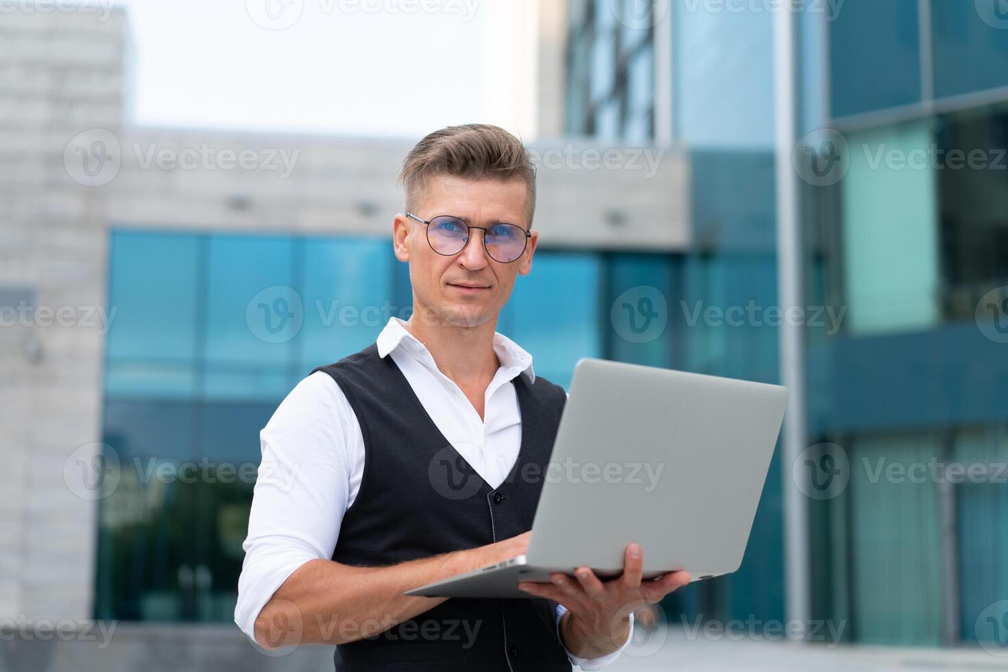 Business. Businessman Using Laptop Outdoors. Modern Technology Concept photo