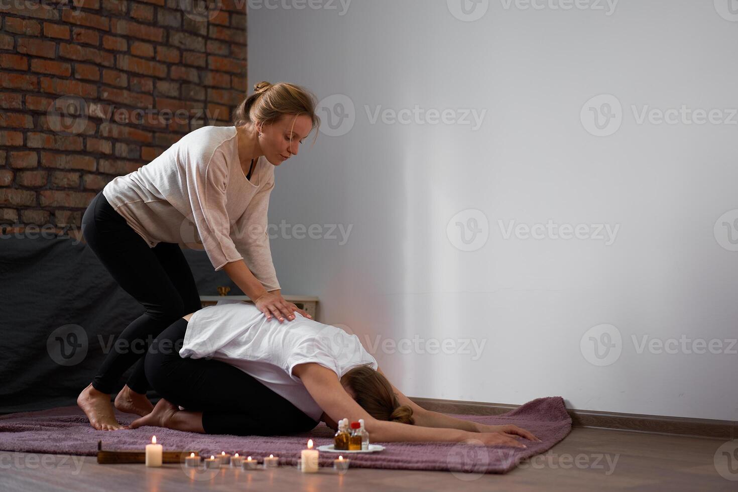 Relax and enjoy in spa salon, getting thai massage by professional masseur. photo