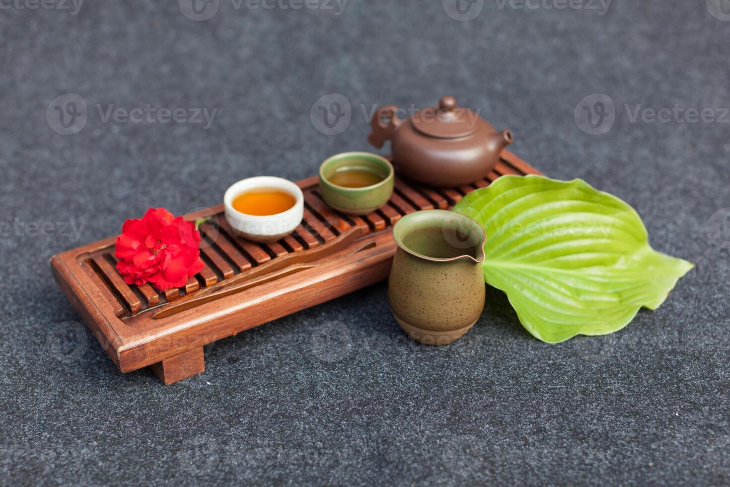 Traditional Chinese tea ceremony with black currant, fruit tea and healthy food. Photo without people. Summer natural vitamins and berries