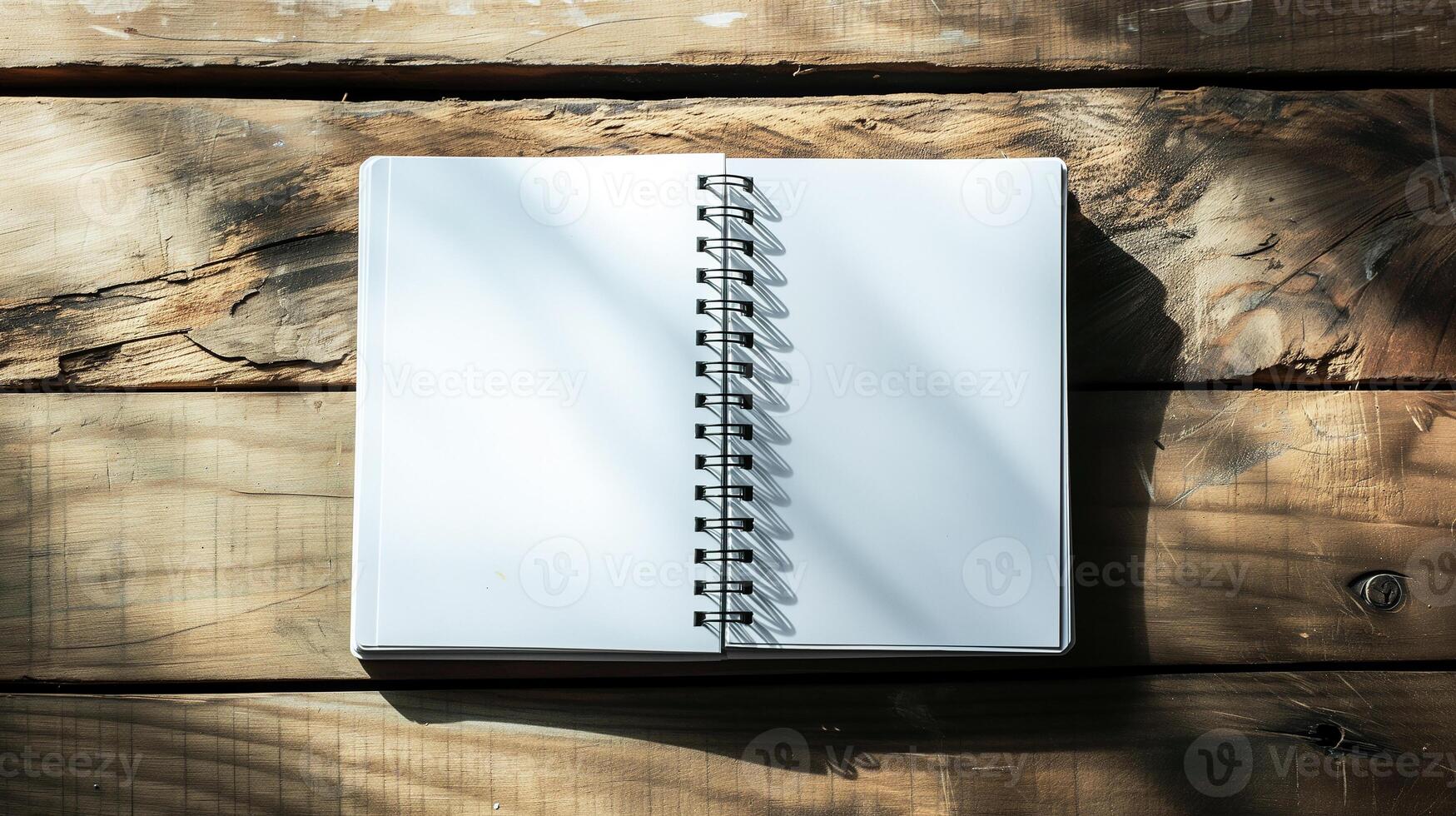 AI generated A mockup of a notebook lying on a wooden background of boards, top view. photo