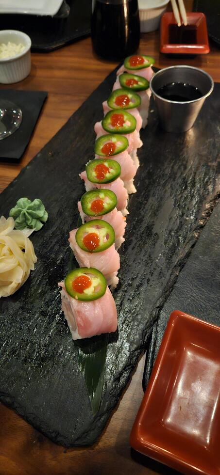 A plate of Yellowtail Sushi photo