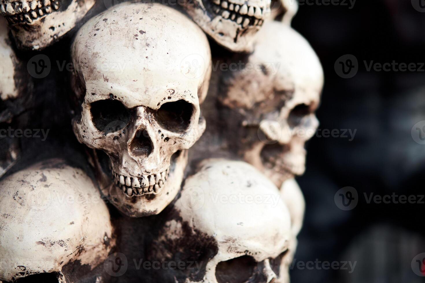 Skull Halloween background Many people skulls stand on top of each other. photo