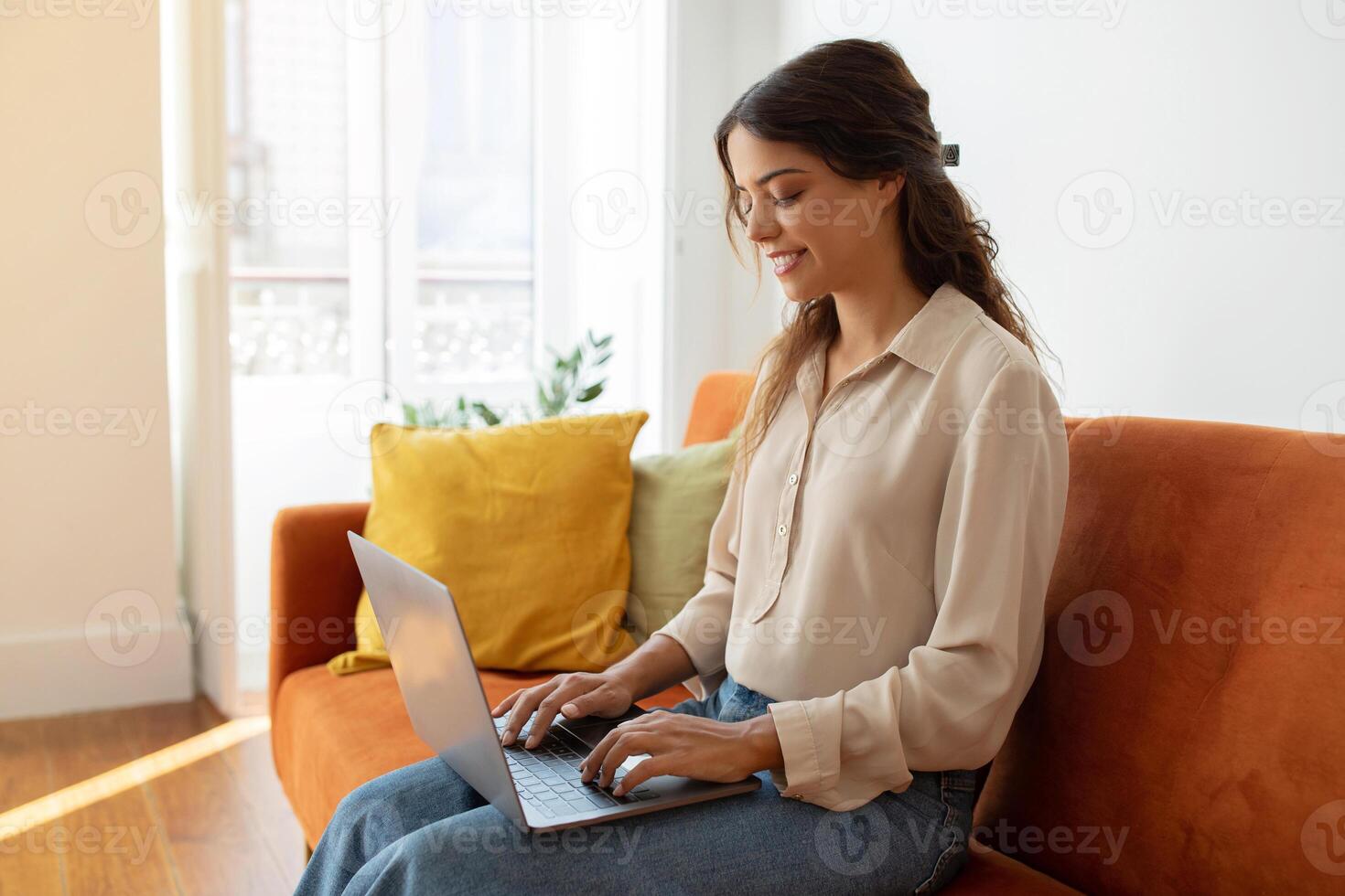 Female Study Or Working With Laptop While Sitting On Couch At Home photo
