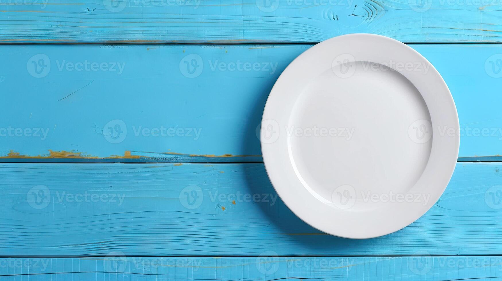 AI generated white empty plate on blue wooden table  top view photo