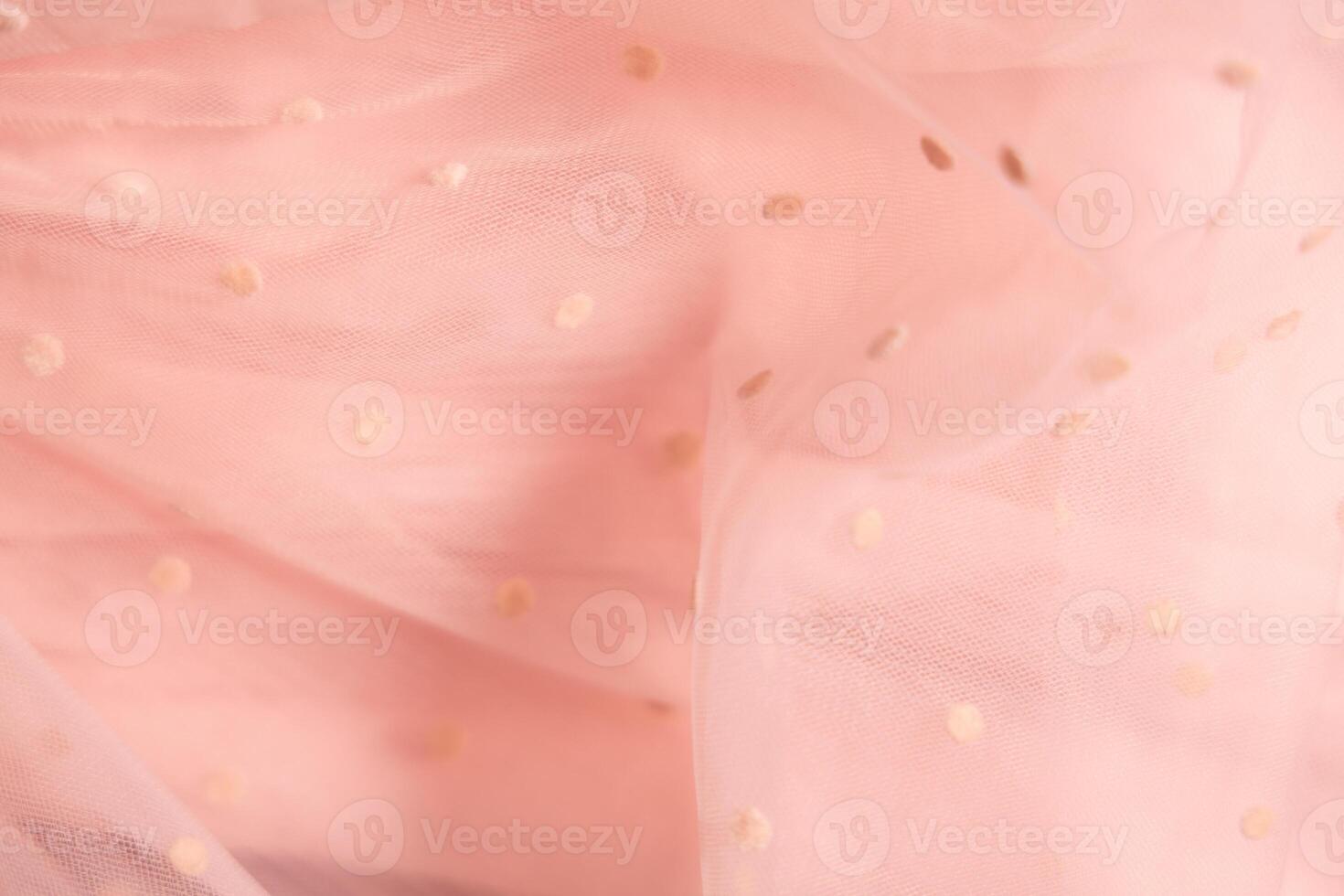 Tulle fabric texture background, textile pattern, pink polka dot on tulle, copy space photo