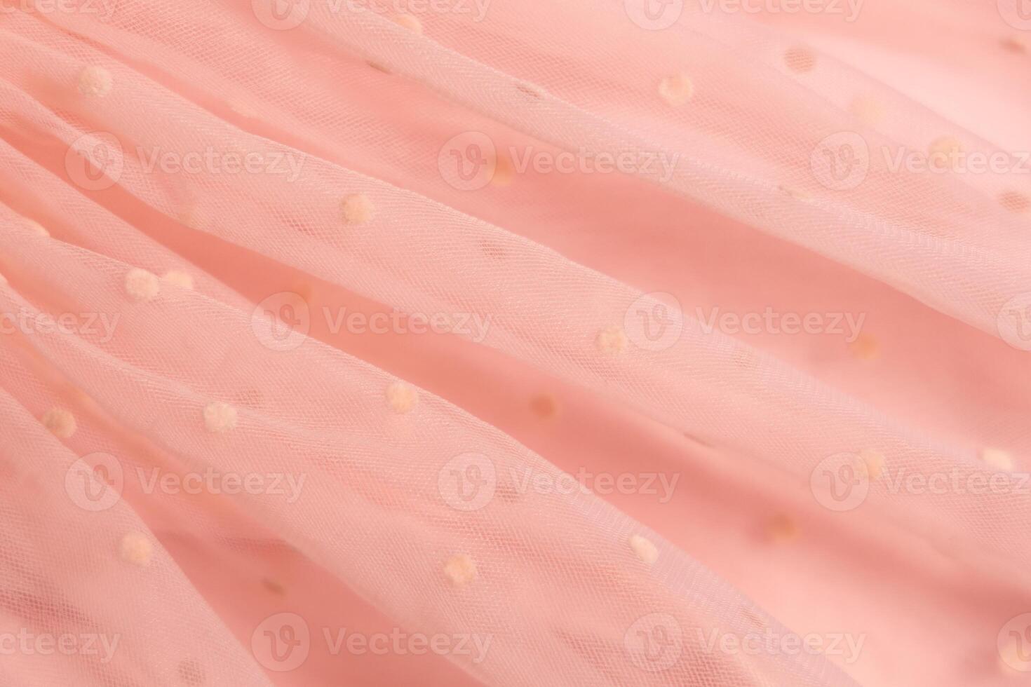 Tulle fabric texture background, textile pattern, pink polka dot on tulle, copy space photo