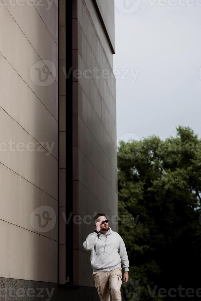 Portrait of handsome stylish hipster guy . photo