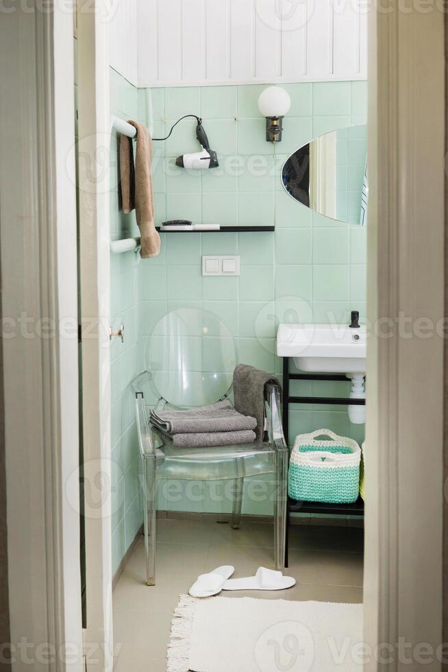 Budget bathroom interior in bright colors. Details of the bathroom interior. photo