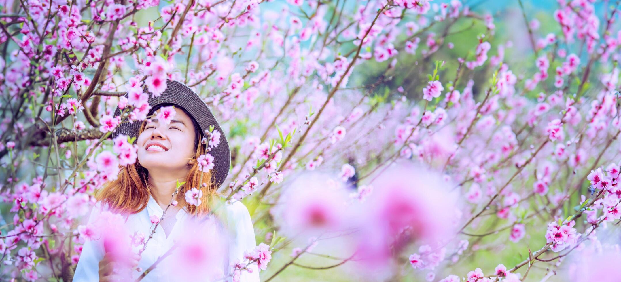 woman asian travel nature. Travel relax. photographed in a flower garden. photo