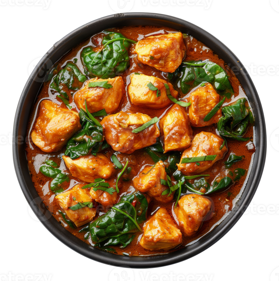 AI generated Spicy chicken tikka masala with spinach in a black bowl on transparent background - stock png. png