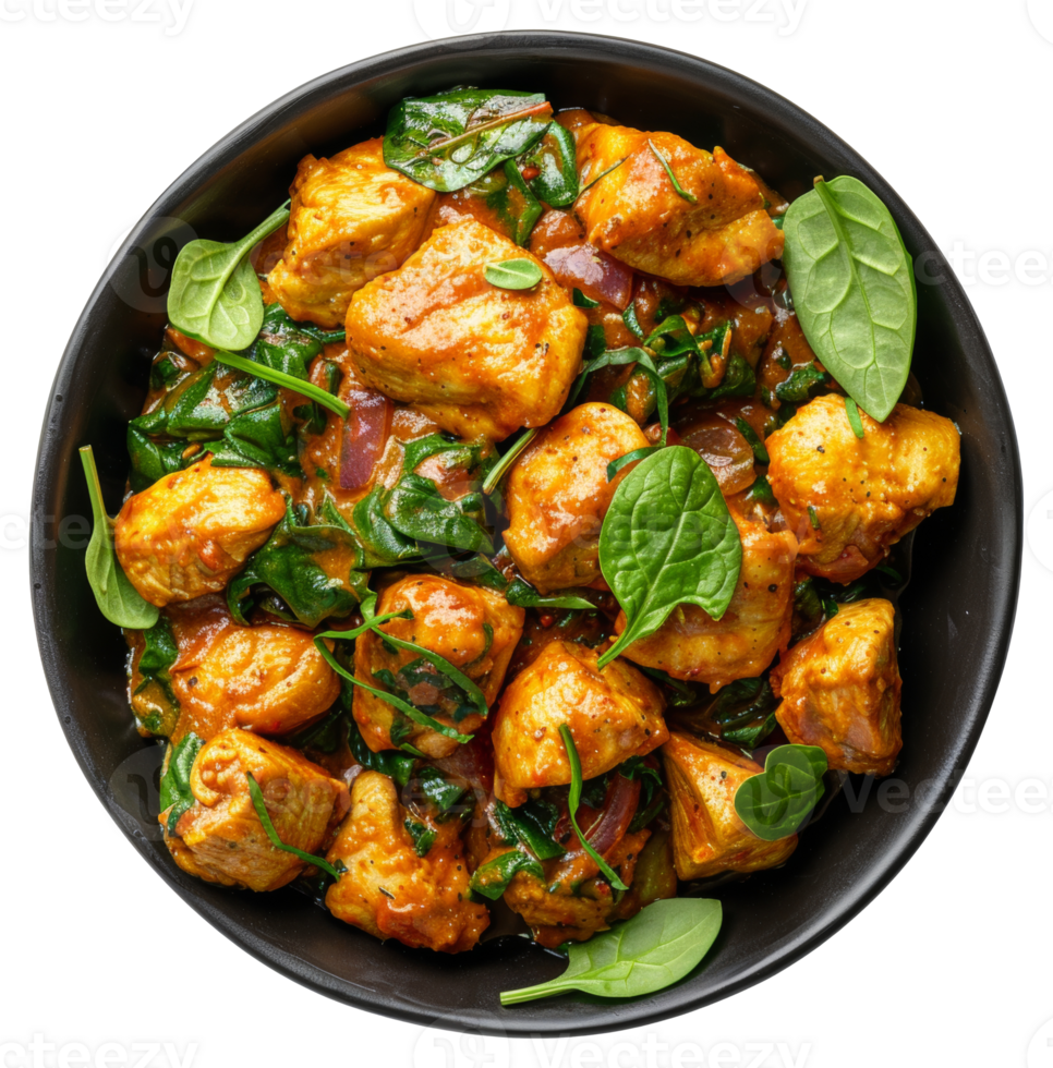 AI generated Spicy chicken tikka masala with spinach in a black bowl on transparent background - stock png. png