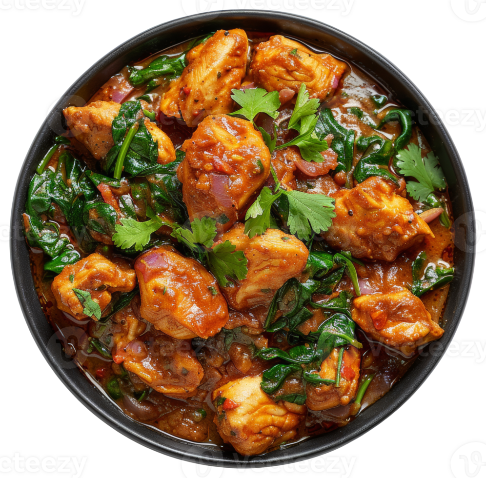 AI generated Spicy chicken tikka masala with spinach in a black bowl on transparent background - stock png. png
